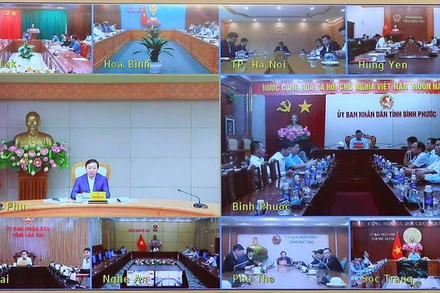 Quang cảnh phiên họp theo hình thức trực tiếp và trực tuyến. Ảnh: VGP