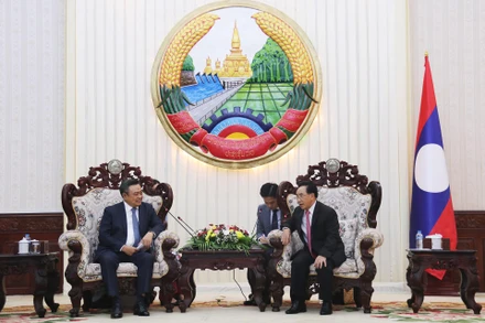 Thủ tướng Lào Phankham Viphavanh tiếp đồng chí Trần Sỹ Thanh. (Ảnh: TRỊNH DŨNG)