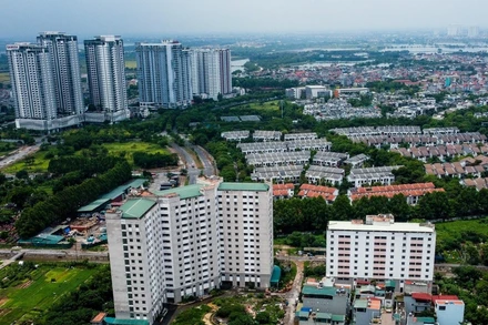 Mức thuế suất 2% theo giá chuyển nhượng hiện nay được cho là một trong những nguyên nhân dẫn đến việc gia tăng sở hữu bất động sản.