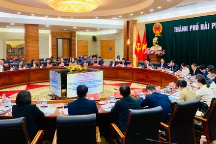 Quang cảnh cuộc gặp gỡ, trao đổi giữa thành phố Hải Phòng với huyện Hà Khẩu, Khu thí điểm thương mại tự do tỉnh Vân Nam (Trung Quốc).