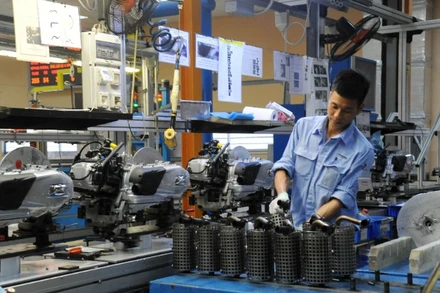 Dây chuyền sản xuất và lắp ráp xe máy ở Công ty TNHH Piaggio Việt Nam (Khu công nghiệp Bình Xuyên, tỉnh Vĩnh Phúc). (Ảnh: Trần Hải)