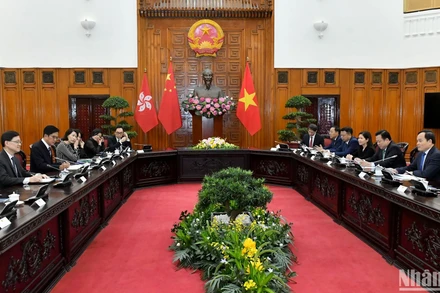 Phó Thủ tướng Trần Lưu Quang hội đàm với Trưởng Khu hành chính đặc biệt Hồng Kông (Trung Quốc) Lý Gia Siêu.