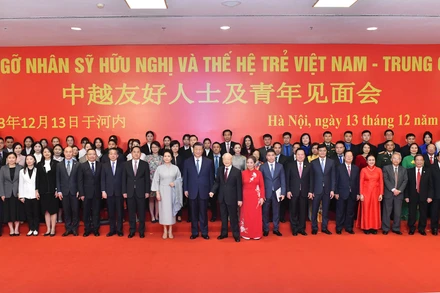 Tổng Bí thư Nguyễn Phú Trọng và Phu nhân, Tổng Bí thư, Chủ tịch Trung Quốc Tập Cận Bình và Phu nhân cùng các đại biểu tham dự Gặp gỡ nhân sĩ hữu nghị và thế hệ trẻ Việt Nam-Trung Quốc năm 2023. (Ảnh: nhandan.vn)