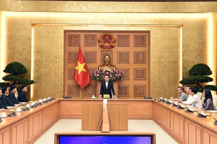 Trưởng Ban Kinh tế Trung ương, Phó Thủ tướng Chính phủ Trần Lưu Quang đã tiếp Đoàn chức sắc, chức việc Giáo hội Tịnh độ Cư sĩ Phật hội Việt Nam nhân dịp đoàn ra thăm Thủ đô Hà Nội. (Ảnh: VGP)