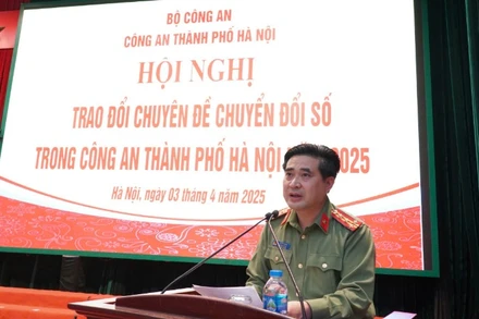 Đại tá Nguyễn Tiến Đạt, Phó Giám đốc Công an thành phố Hà Nội phát biểu tại hội nghị.