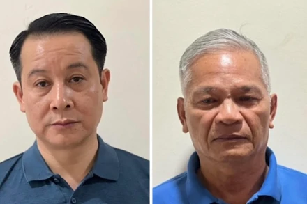 Bị can Phạm Hoàng Anh (bên trái) và bị can Lê Viết Chữ (bên phải).