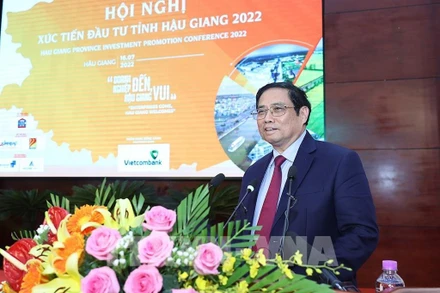 Thủ tướng Chính phủ Phạm Minh Chính phát biểu tại Hội nghị xúc tiến đầu tư tỉnh Hậu Giang năm 2022. Ảnh: DƯƠNG GIANG/TTXVN