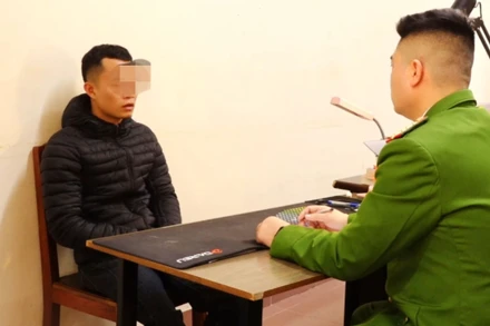 Nguyễn Văn Hoàng tại cơ quan công an.