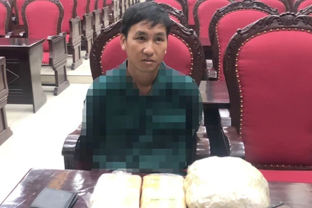 Đối tượng Giàng A Hờ cùng tang vật bị bắt giữ.