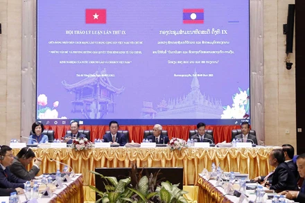 Hội thảo lý luận lần thứ 9 giữa Đảng Cộng sản Việt Nam và Đảng Nhân dân Cách mạng Lào. (Ảnh: TTXVN)