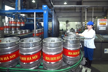 Dây chuyền sản xuất tại Nhà máy bia Hà Nội .(Ảnh ĐĂNG ANH)