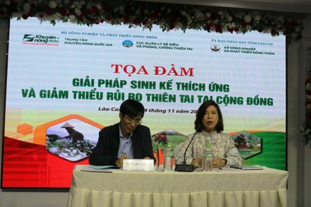 Tọa đàm "Giải pháp sinh kế thích ứng và giảm thiểu rủi ro thiên tai cộng đồng" tại Lào Cai. (Ảnh: MÙA XUÂN)