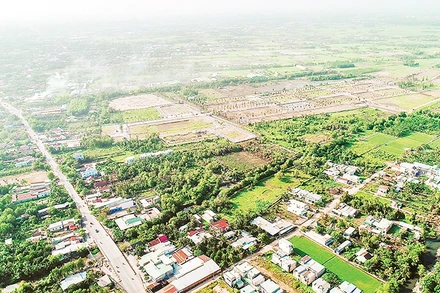 Thuế chuyển mục đích sử dụng đất sẽ tăng cao nhiều lần nếu áp dụng bảng giá đất điều chỉnh. (Ảnh chụp tại huyện Củ Chi) 