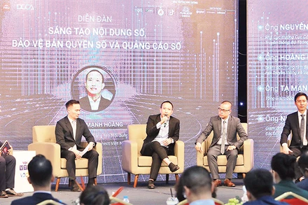 Các đại biểu tại Diễn đàn sáng tạo nội dung số, bảo vệ bản quyền số và quảng cáo số. 