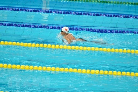 Đoàn Thể thao Việt Nam giành tấm Huy chương Vàng duy nhất nhờ công Vận động viên Lê Tiến Đạt (hạng thương tật SB5) ở nội dung bơi ếch 100m. (Ảnh: TTXVN)