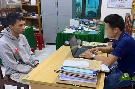 Đối tượng Nguyễn Duy Quang tại cơ quan Công an.