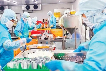 Chế biến hàng xuất khẩu tại Công ty cổ phần Saigon Food (Ảnh: nhandan.vn).