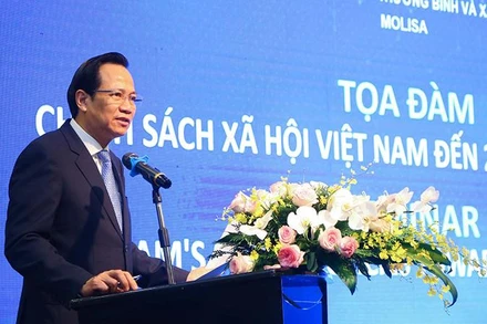 Bộ trưởng Lao động-Thương binh và Xã hội Đào Ngọc Dung phát biểu tại tọa đàm.