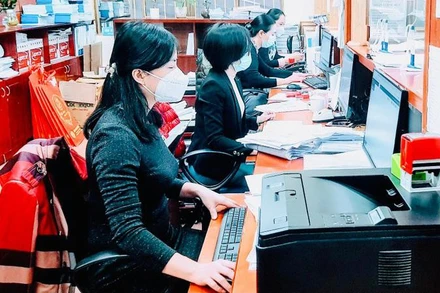 Giao dịch tại Bảo hiểm xã hội Hải Phòng (Ảnh minh họa: Quang Dũng).