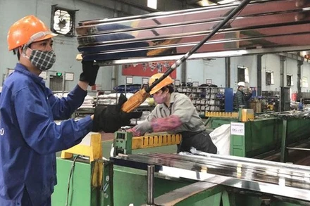 Lao động tại Tập đoàn Inox Hoàng Vũ, Hà Nội. (Ảnh minh họa: nhandan.vn)