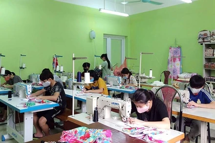 Học sinh tại Trung tâm Phục hồi chức năng người khuyết tật Thụy An, Hà Nội. (Ảnh: Molisa).