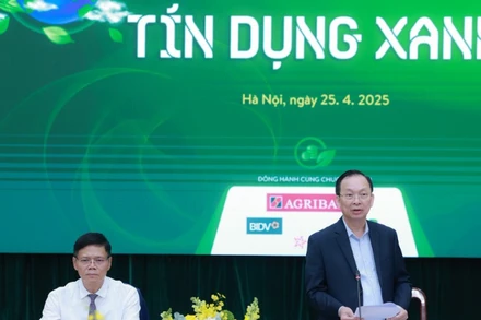 Phó Thống đốc Thường trực Ngân hàng Nhà nước Đào Minh Tú phát biểu tại hội thảo. (Ảnh: MINH PHƯƠNG)