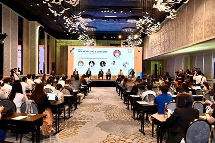 Quang cảnh diễn đàn về cơ chế đặc thù và dòng vốn cho thị trường bất động sản.