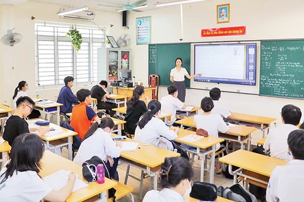 Học sinh Trường THCS Ngọc Lâm (Long Biên) ôn tập chuẩn bị cho kỳ thi lớp 10. (Ảnh THANH TÙNG)