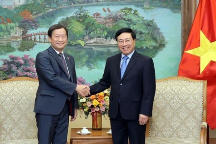 Phó Thủ tướng Thường trực Chính phủ Phạm Bình Minh tiếp Phó Chủ tịch điều hành cấp cao Cơ quan Hợp tác quốc tế Nhật Bản (JICA) Junichi Yamada. Ảnh: VGP