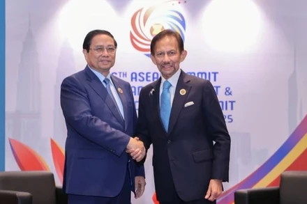 Thủ tướng Chính phủ Phạm Minh Chính gặp Quốc vương Brunei Darussalam Sultan Haji Hassanal Bolkiah. (Ảnh: VGP/Nhật Bắc)