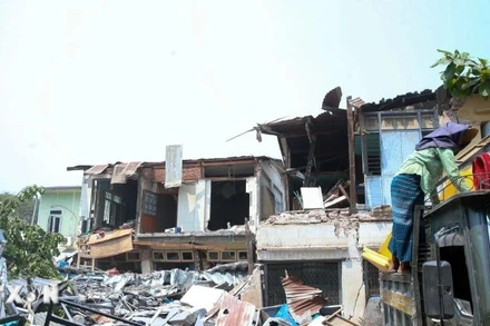 Hiện trường đổ nát sau động đất tại thị trấn Tada-U, Myanmar. (Ảnh: THX/TTXVN)