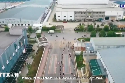 Hình ảnh trong phóng sự của TF1 mô tả vùng ven Hà Nội được ví như "đại lộ Champs-Élysées công nghiệp của miền bắc Việt Nam". (Ảnh: TTXVN phát)