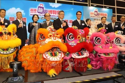 Các đại biểu tại lễ khai mạc hội chợ triển lãm. (Ảnh: TTXVN)