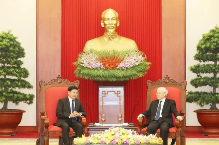 Tổng Bí thư Nguyễn Phú Trọng và Tổng Bí thư, Chủ tịch nước Lào Thongloun Sisoulith. Ảnh: TTXVN