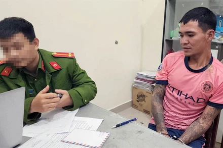 Đối tượng Đen tại cơ quan công an.