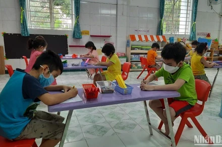 Học sinh Trường mầm non Tuổi thơ 7, quận 3, Thành phố Hồ Chí Minh trong giờ học.