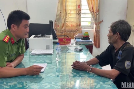 Hung thủ Lê Đình Thuyết tại cơ quan công an.