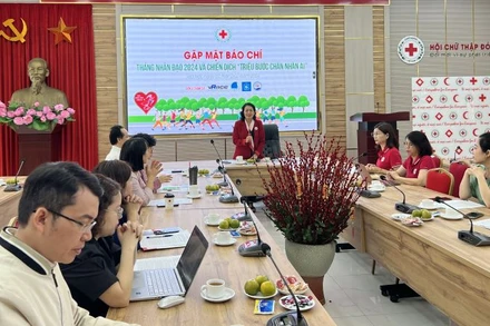 Quang cảnh buổi gặp mặt báo chí. 