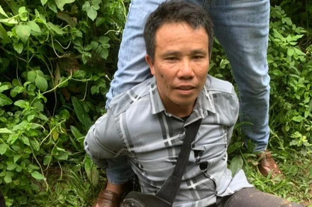 Đối tượng Lù A Mang bị lực lượng chức năng bắt giữ khi đang vận chuyển 3 bánh heroin đi bán.