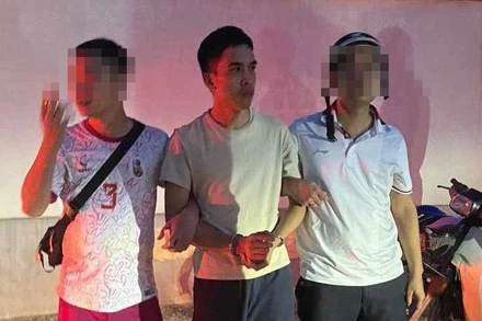 Đối tượng Nguyễn Đức Trung khi bị bắt.