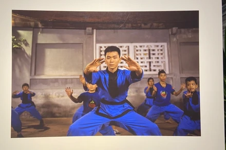 Động tác uyển chuyển và mạnh mẽ của võ sĩ trong ống kính của nhiếp ảnh gia Philippe Marinig.