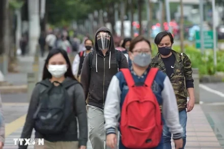 Người dân đeo khẩu trang để phóng HMPV. (Ảnh minh họa từ TTXVN/Xinhua)