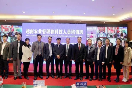 Các đại biểu dự lễ khai mạc tại điểm cầu tỉnh Vân Nam, Trung Quốc.