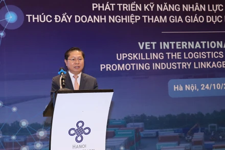 Thứ trưởng Lao động-Thương binh và Xã hội Lê Tấn Dũng phát biểu tại Diễn đàn.