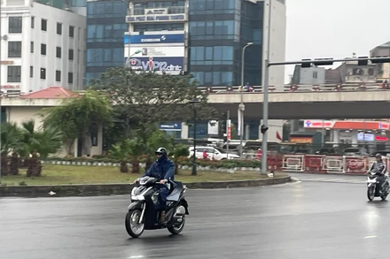 Khu vực Hà Nội có mưa phùn, trời rét. Ảnh: ĐT