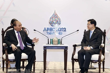 Sáng 19/11, tại thủ đô Bangkok, Thái Lan, Chủ tịch nước Nguyễn Xuân Phúc gặp ông Lý Gia Siêu, Trưởng Khu hành chính đặc biệt Hong Kong-Trung Quốc. (Ảnh: TTXVN)