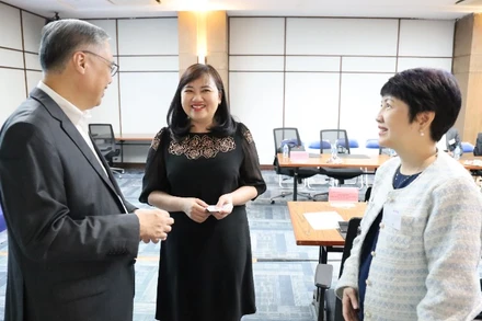 Các đại biểu đang trao đổi về những cơ hội từ chính sách thương mại mới của Hoa Kỳ.