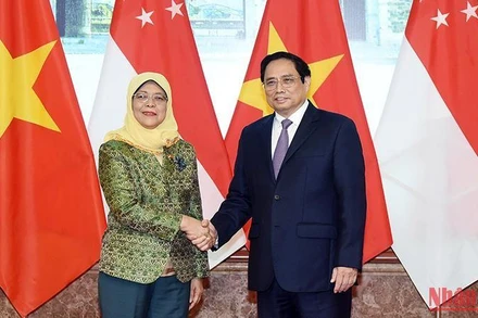 Thủ tướng Phạm Minh Chính và Tổng thống Cộng hòa Singapore Halimah Yacob.