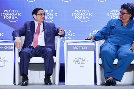 Thủ tướng Phạm Minh Chính tại Phiên thảo luận với chủ đề “Đương đầu với các cơn gió ngược: khởi động lại tăng trưởng trong bối cảnh mong manh”.