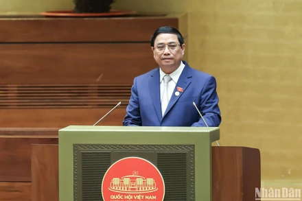 Thủ tướng Chính phủ Phạm Minh Chính báo cáo kết quả thực hiện Kế hoạch phát triển kinh tế-xã hội năm 2023, dự kiến Kế hoạch phát triển kinh tế-xã hội năm 2024. (Ảnh: ĐĂNG KHOA)